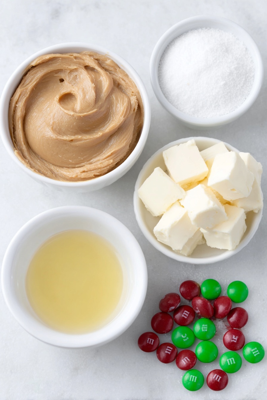 Creamy Peanut Butter Fudge, peanut butter fudge recipe, easy peanut butter fudge, homemade peanut butter fudge, quick fudge recipes - Flat lay of a small white ceramic bowl filled with fresh creamy peanut butter, a small white ceramic bowl of unsalted butter cubes, a small white ceramic bowl holding fine white powdered sugar, a small white ceramic bowl containing clear water, a small white ceramic bowl with golden vanilla extract, a scattering of red and green M&M’s candies, all arranged in perfect symmetry and natural proportions, placed on a clean white marble surface, soft natural light, photo taken with an iPhone, professional food photography style, fresh ingredients, white ceramic bowls, no bottles, no duplicates, no utensils, no packaging --ar 2:3 --v 7 --p m7354615311229779997